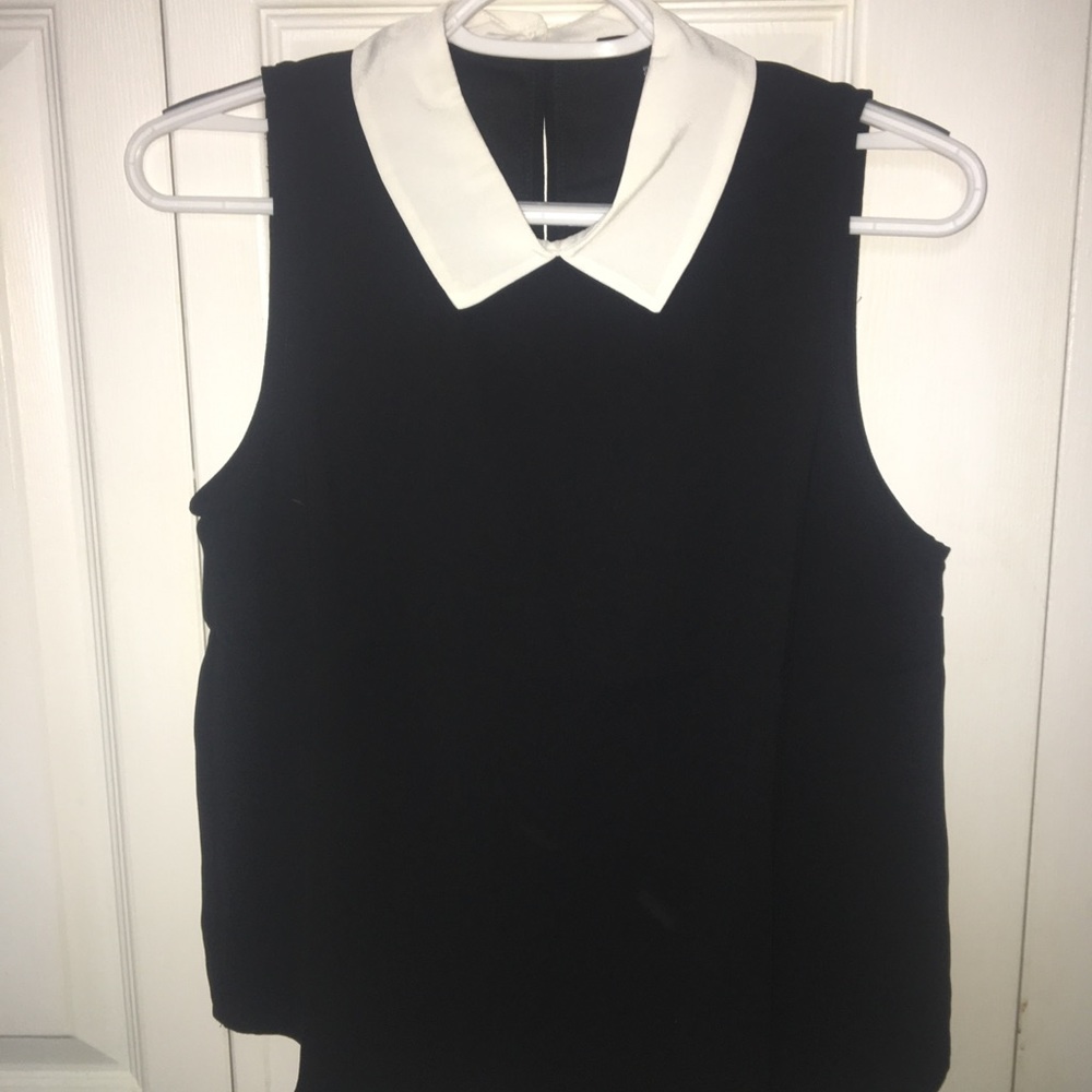 Black top with white collar and detailing